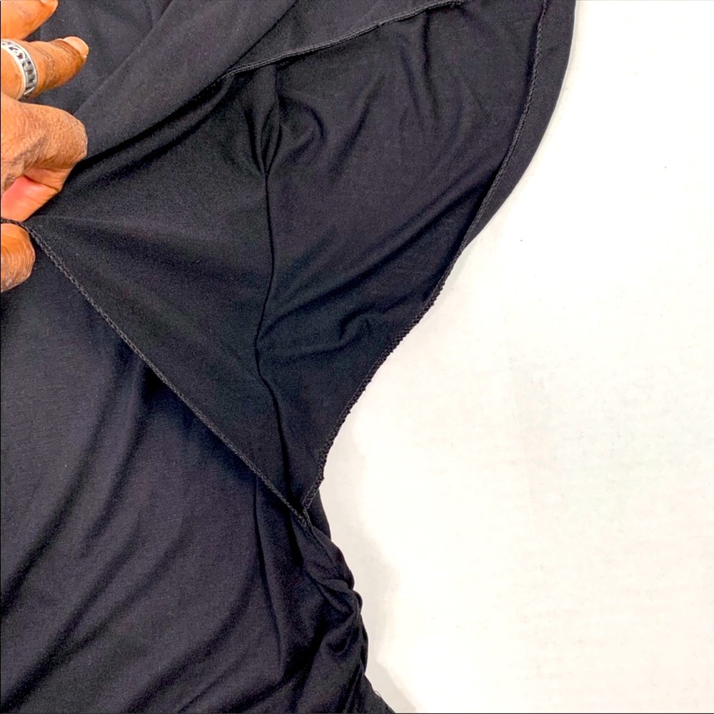New ladies Wing sleeved black tunic top. One size.